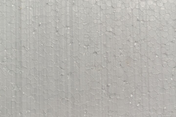 Surface of the cut bubble foam polystyrene. Close-up.