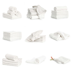 set of white spa Folded clean soft towels on white background