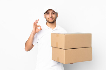 Delivery Arabian man isolated on blue background showing an ok sign with fingers