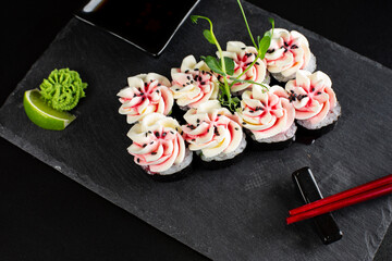Obraz na płótnie Canvas japanese sushi food. Maki ands rolls with tuna.