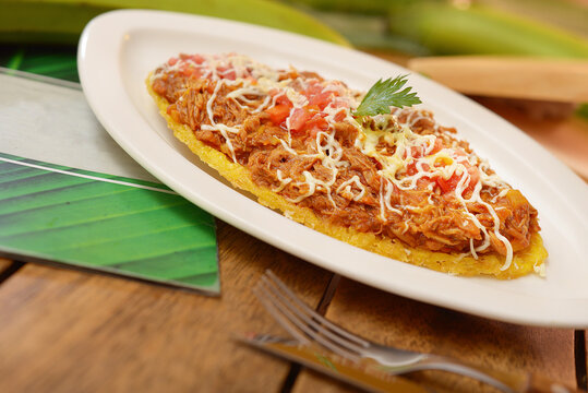 patacon, typical Colombian food, patacon with chicken and cheese