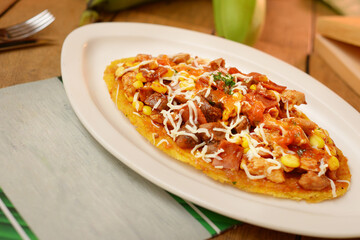 patacon, typical Colombian food, patacon with chicken and cheese