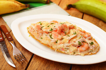 patacon, typical Colombian food, patacon with chicken and cheese