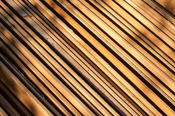 Fullframe background texture of The golden teak wood at Wat Khun Samut Chin temple, Samut Prakan province, Thailand