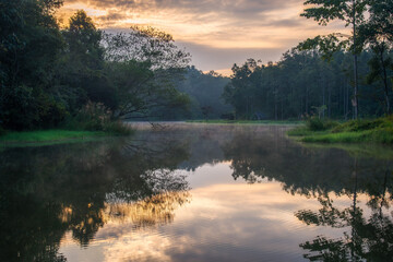 Fototapeta na wymiar Beautiful sunrise shot at chiangrai Reservoir Park