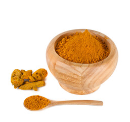Turmeric powder spice heap in a wooden mortar, natural turmeric roots and wooden spoon of turmeric powder isolated on a white background. 