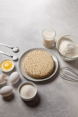 Obraz na płótnie Canvas Ingredients for making pancakes for Shrovetide