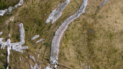 Patches of ice on field.