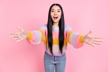 Photo of young beautiful excited smiling lovely girl with open hands hug embrace you isolated on pink color background