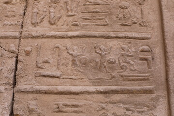 Karnak temple in historic city. Ruins of the ancient town. View of the antique famous sculptures at the Karnak Temple in Luxor, Egypt. Travel to African continent. UNESCO World Heritage Site.