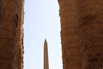 Karnak temple in historic city. Ruins of the ancient town. View of the antique famous sculptures at...