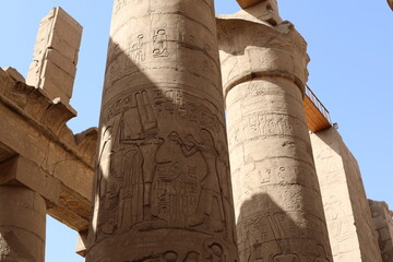 Karnak temple in historic city. Ruins of the ancient town. View of the antique famous sculptures at...