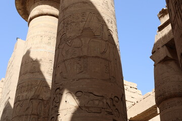 Karnak temple in historic city. Ruins of the ancient town. View of the antique famous sculptures at...