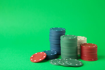 Poker chips on a green background. Casino
