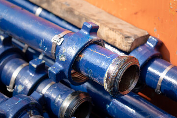 Group of rigid tubing or piping for high pressure testing. Close-up and selective focus at the...