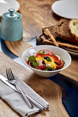 Classic Greek salad. Banquet festive dishes. Gourmet restaurant menu. White background.