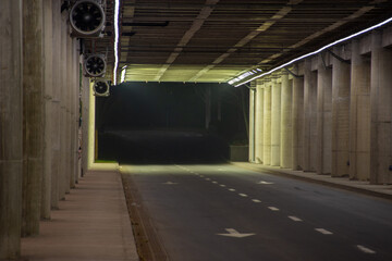 Close up of tunnel illuminated at end.