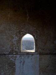 Arched Window in Ruins of Mughal Fort in Rajasthan, India