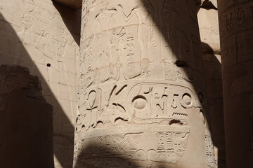Karnak temple in historic city. Ruins of the ancient town. View of the antique famous sculptures at...