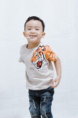 boy eats lollipops on white background
