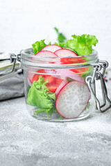 healthy vegetable salad tomato, cucumber, radish mix lettuce portion on the table meal snack copy space food background rustic image diet vegan or vegetarian food