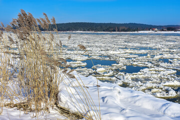Ice floes on the frozen Vistula river. Beautiful winter landscape 