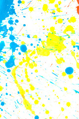 Fototapeta na wymiar Orange, Blue and Yellow Acrylic Paint Splatters and Lines on White Bckground