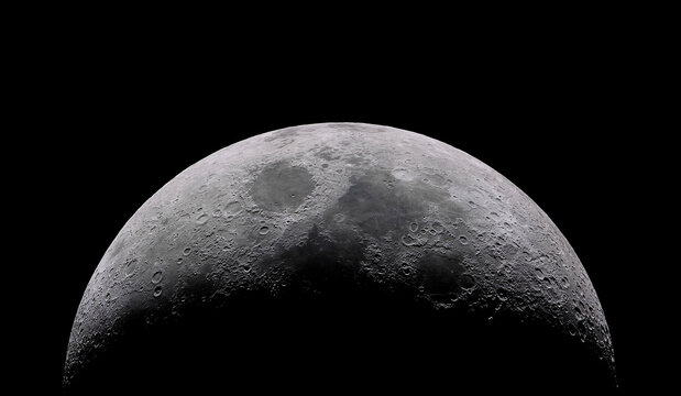Waxing crescent moon as seeing from the southern hemisphere. Amazing the moon rough surface full of craters from meteorites coming from the universe and crashing our satellite the Moon an awe relief