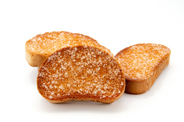 a piece of brown bread biscuit isolated on a white background
