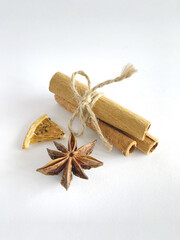 Set of spices cinnamon, star anise, dried orange slice on white background