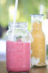 Glass with tasty strawberry smoothie