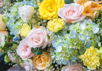 Beautiful, colorful, vibrant bouquet of flowers; roses, irises, daisies, hydrangea,.. Wedding, event, women's day concept