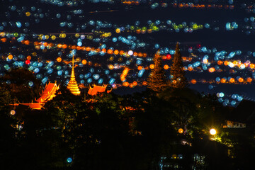 night view of the temple and city on the mountain
