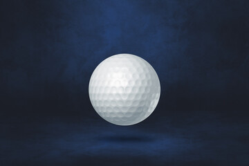 White golf ball on a dark blue studio background