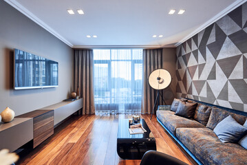 Living room with a large window.