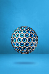 Speakers sphere on a blue studio background