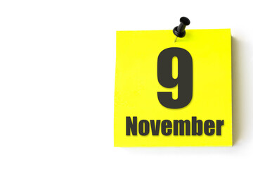 November 9th. Day 9 of month, Calendar date. Yellow sheet of the calendar. Autumn month, day of the...