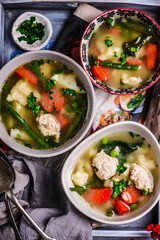 vegetable soup with meatballs and dumplings.style rustic