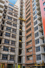 Fototapeta premium Walls of multi-storey building under construction