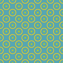 Seamless vector pattern with neon yellow polka dots on mint blue background
