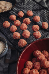 Raw home made Italian traditional meatballs