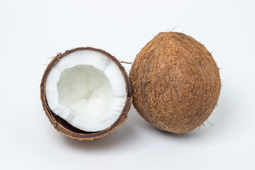 Isolated coconut on a white background. Whole and split coconut. Healthy food