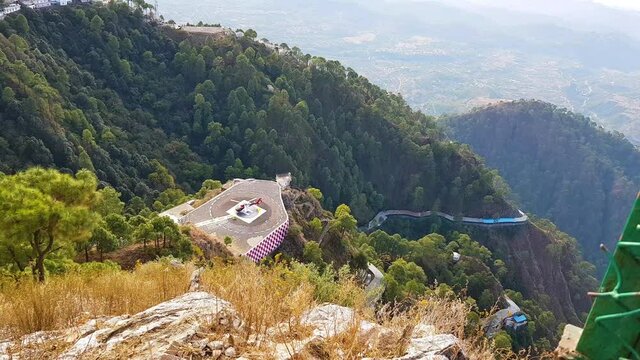 Helicopter deporting passengers at Sanjhi Chhat helipad