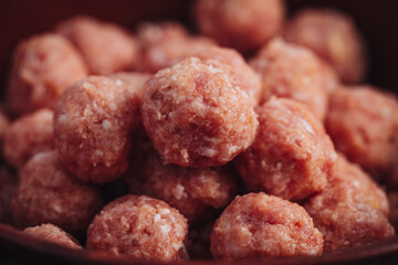 Raw home made Italian traditional meatballs