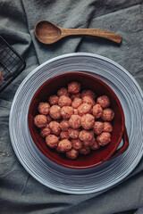 Raw home made Italian traditional meatballs