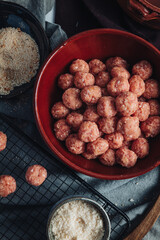 Raw home made Italian traditional meatballs