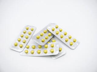 Valerian tablets in a yellow shell in a blister pack. A light sedative and hypnotic. The root of Valerian. The plant. Many.