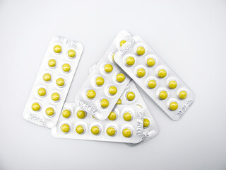 Valerian tablets in a yellow shell in a blister pack. A light sedative and hypnotic. The root of Valerian. The plant. Many.