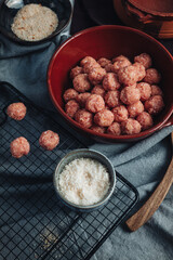 Raw home made Italian traditional meatballs