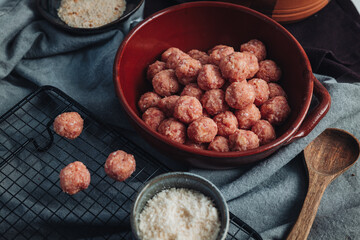 Raw home made Italian traditional meatballs